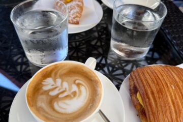 Image of a typical breakfast in Italy Turin, capuccino, espresso and croissants