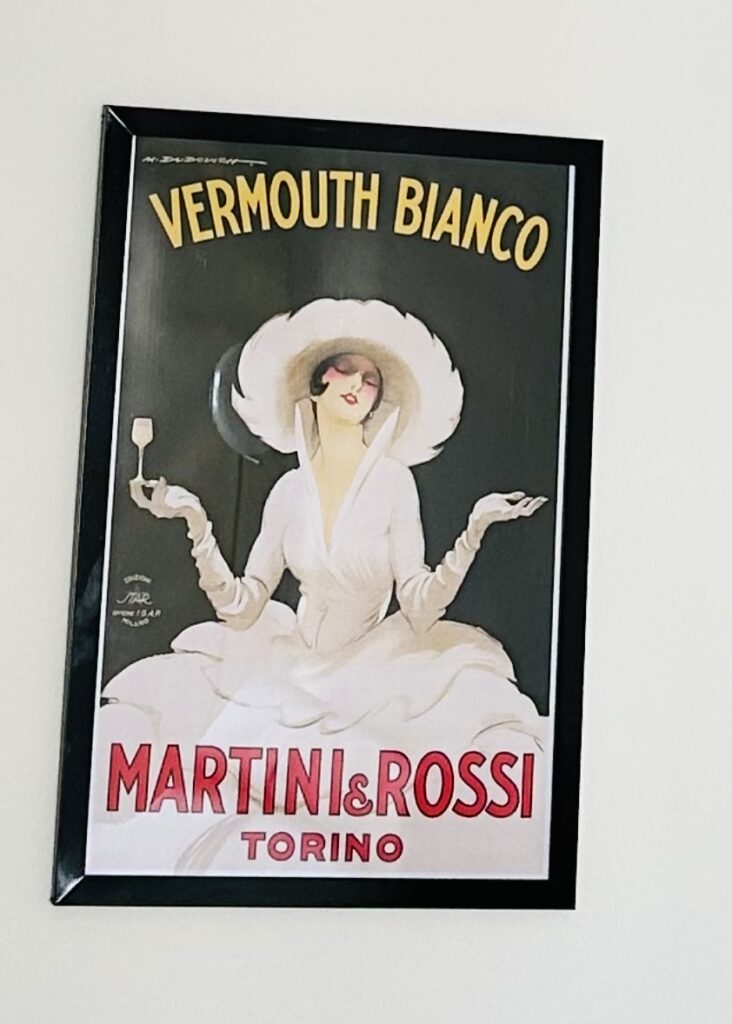 close up of a picture showing the advertising of the famouse Martini Rossi  Vermoth brand, which was founded in Turin Italy