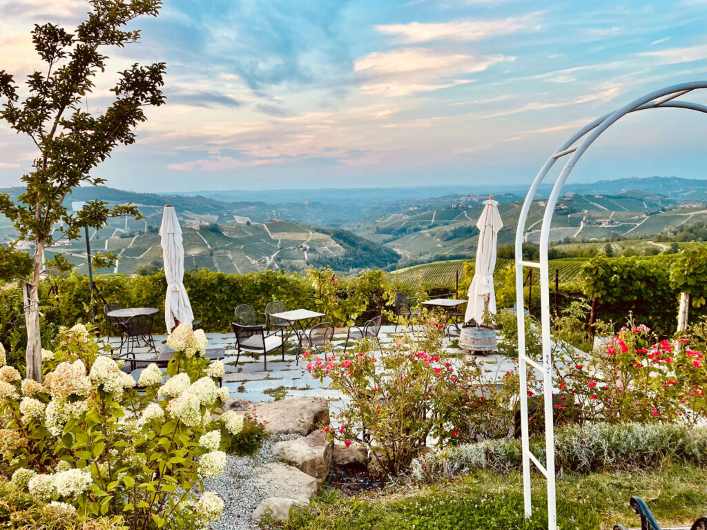Aperitivo table overlooking the Langhe vineyards at golden hour